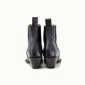 The Sandra Boot in Black Patent Leather
